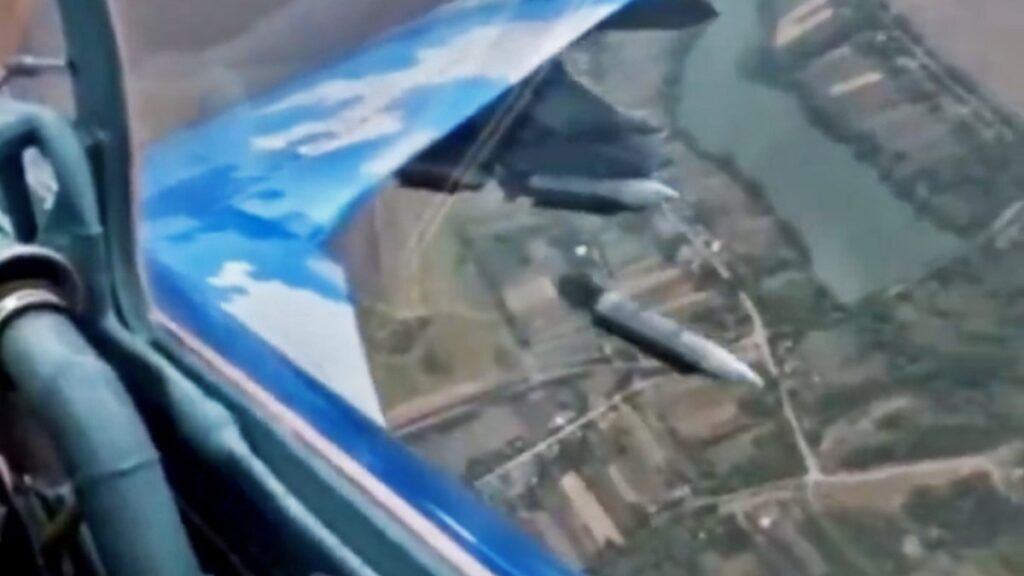 Exclusive Footage: Ukrainian Su-27 Fighter Jet Drops GBU-39 Small Diameter Bombs in Intense Aerial Combat